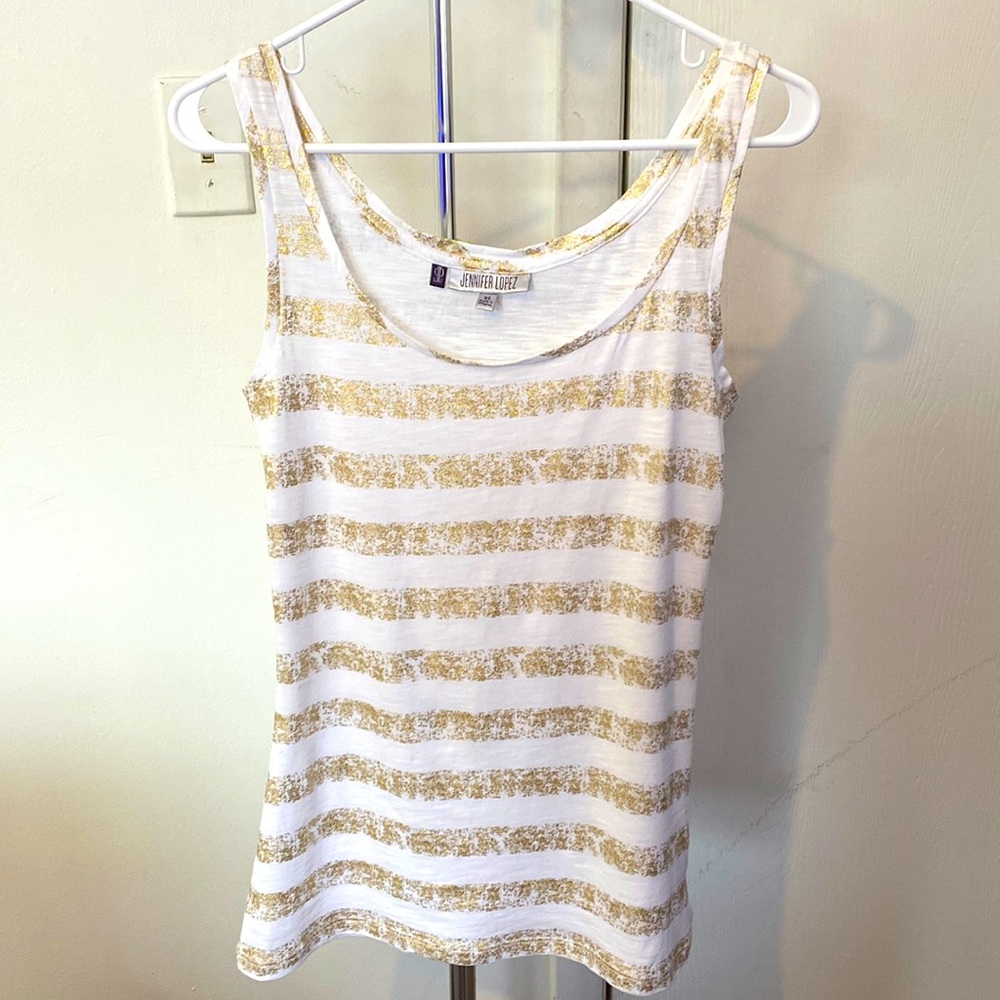 White and gold striped tank top.